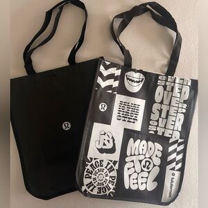 2 large Lululemon tote shopping bags.